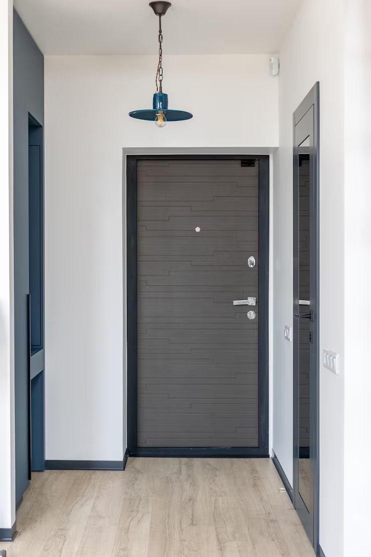 Adjustable automatic door arm